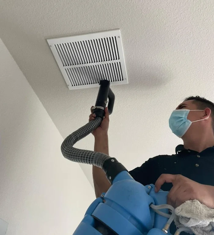 air duct cleaning using hand-held vacuum machine