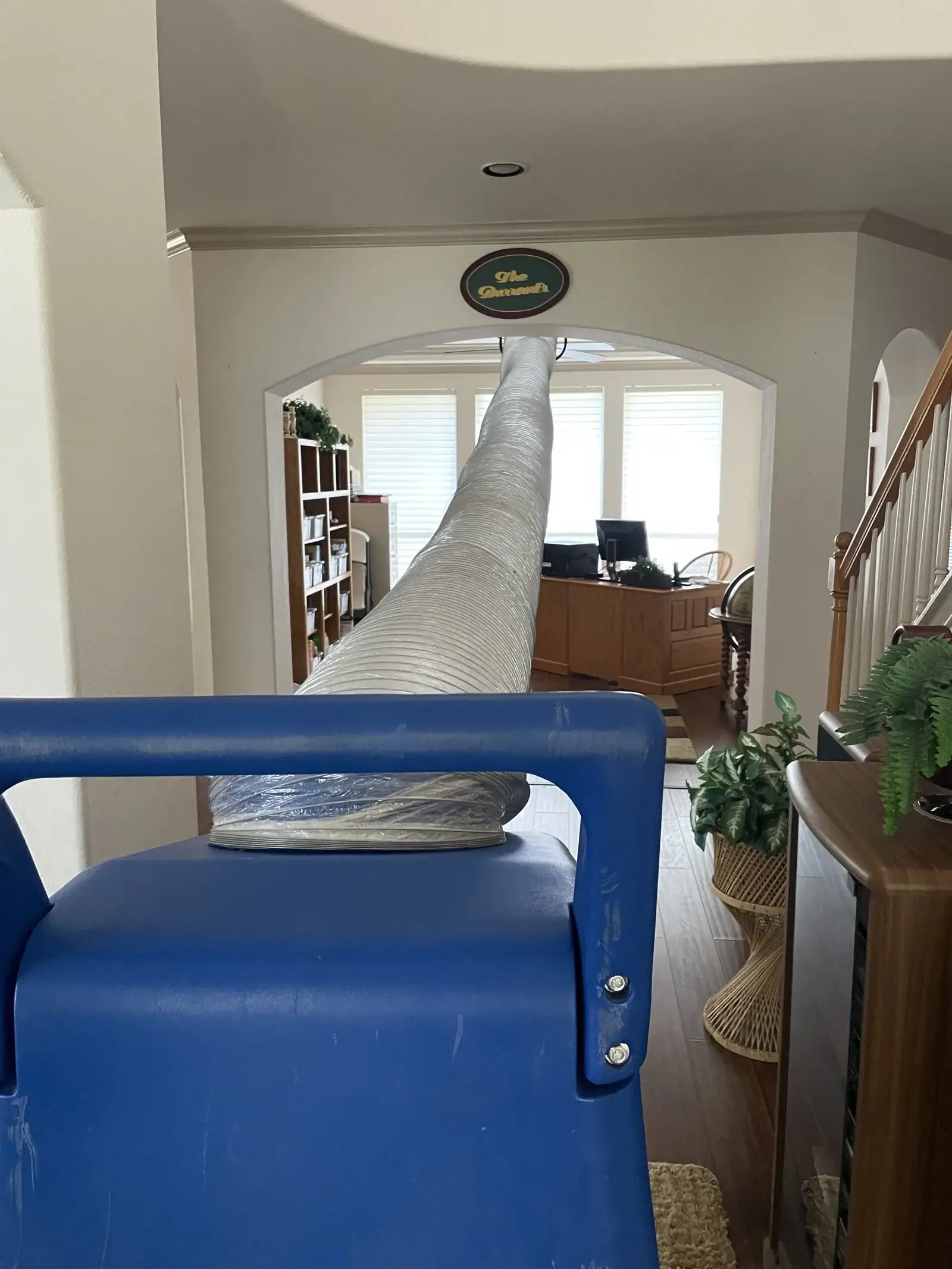 negative air machine attached to a ceiling